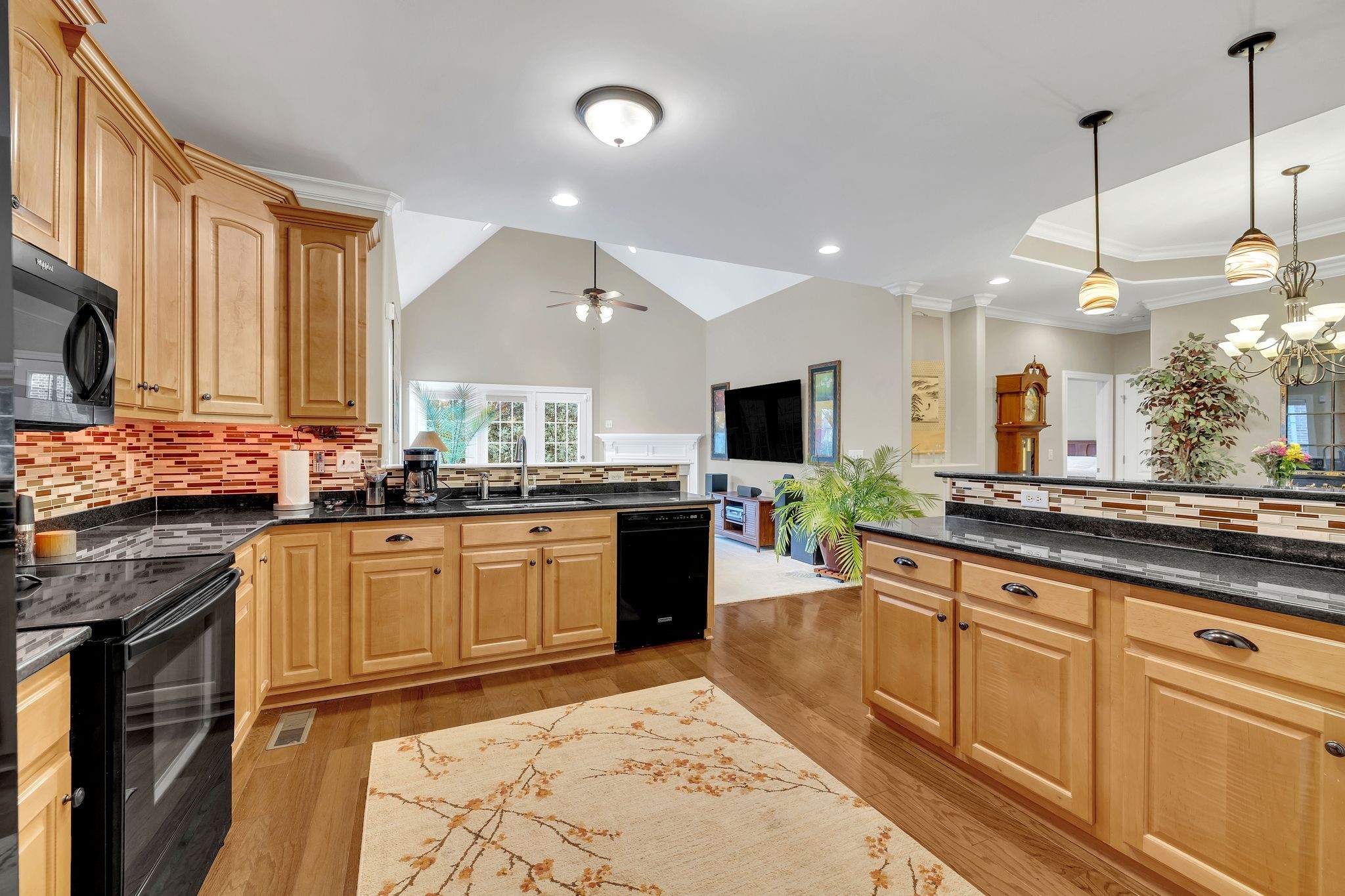 2009 Sunflower Drive Spring Hill, TN 37174 - Photo 21 of 34 a kitchen with stainless steel appliances granite countertop sink stove top oven and cabinets