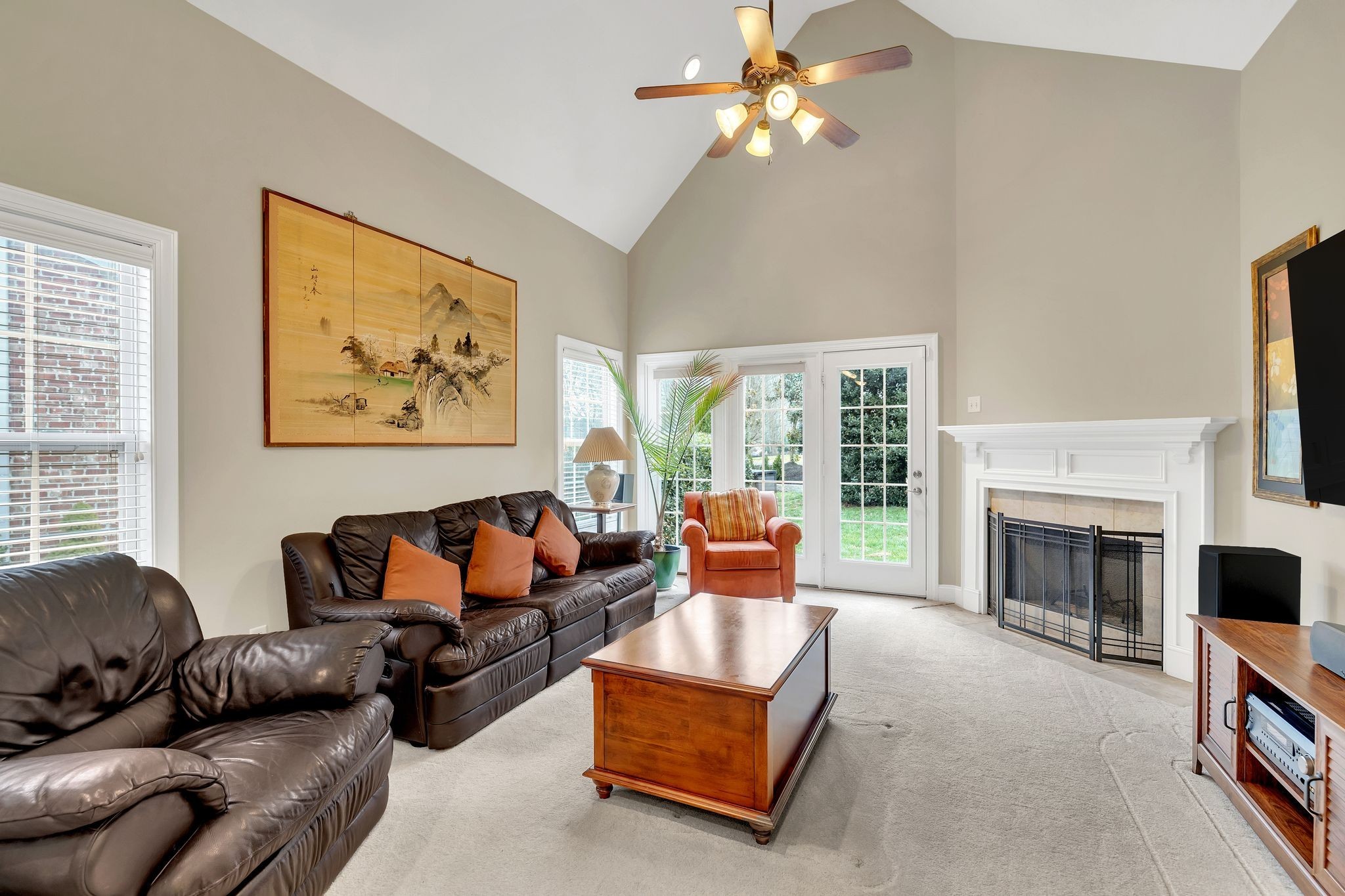 2009 Sunflower Drive Spring Hill, TN 37174 - Photo 23 of 34 a living room with furniture a fireplace and a large window