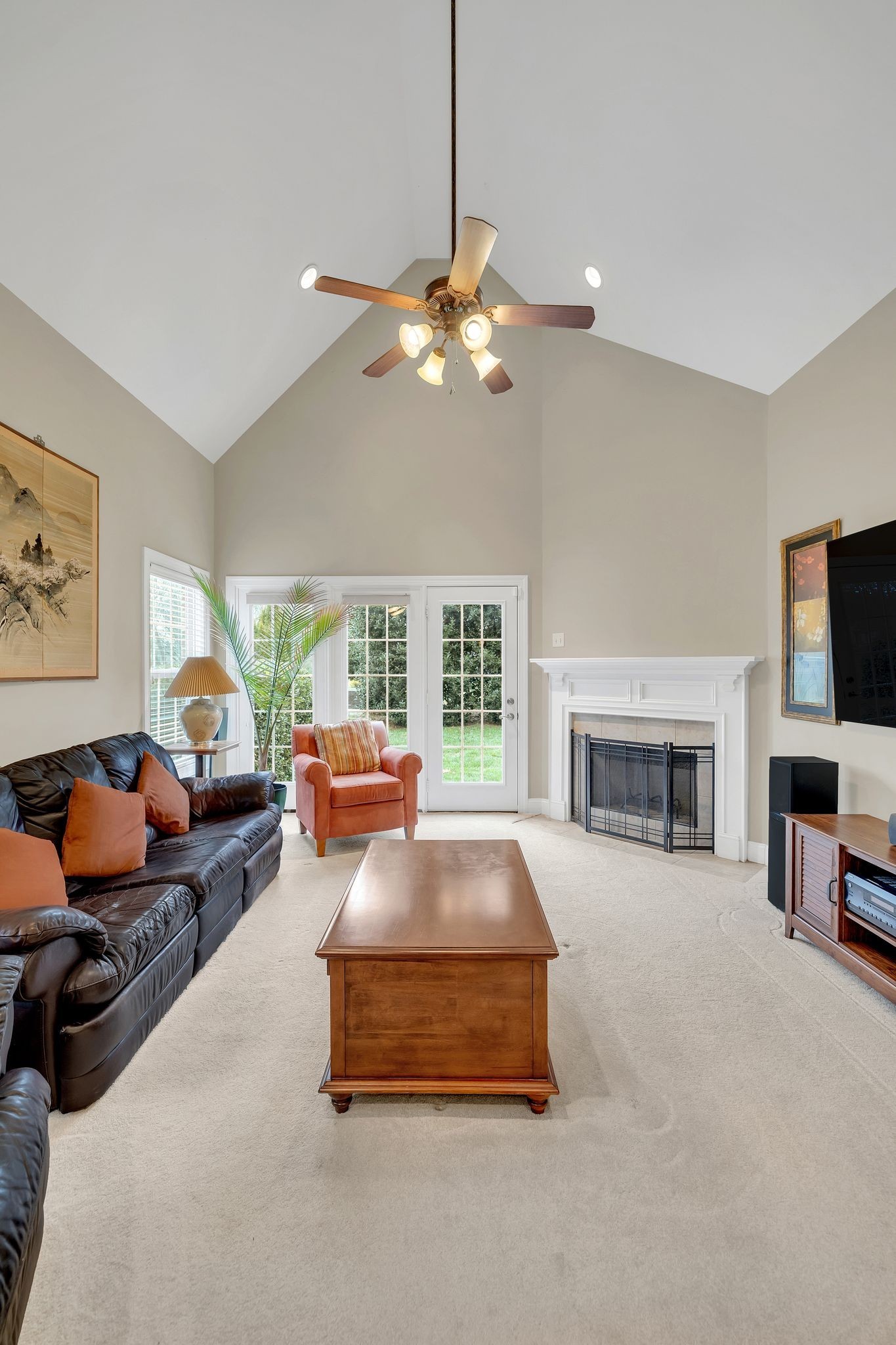 2009 Sunflower Drive Spring Hill, TN 37174 - Photo 24 of 34 a living room with furniture fireplace and flat screen tv