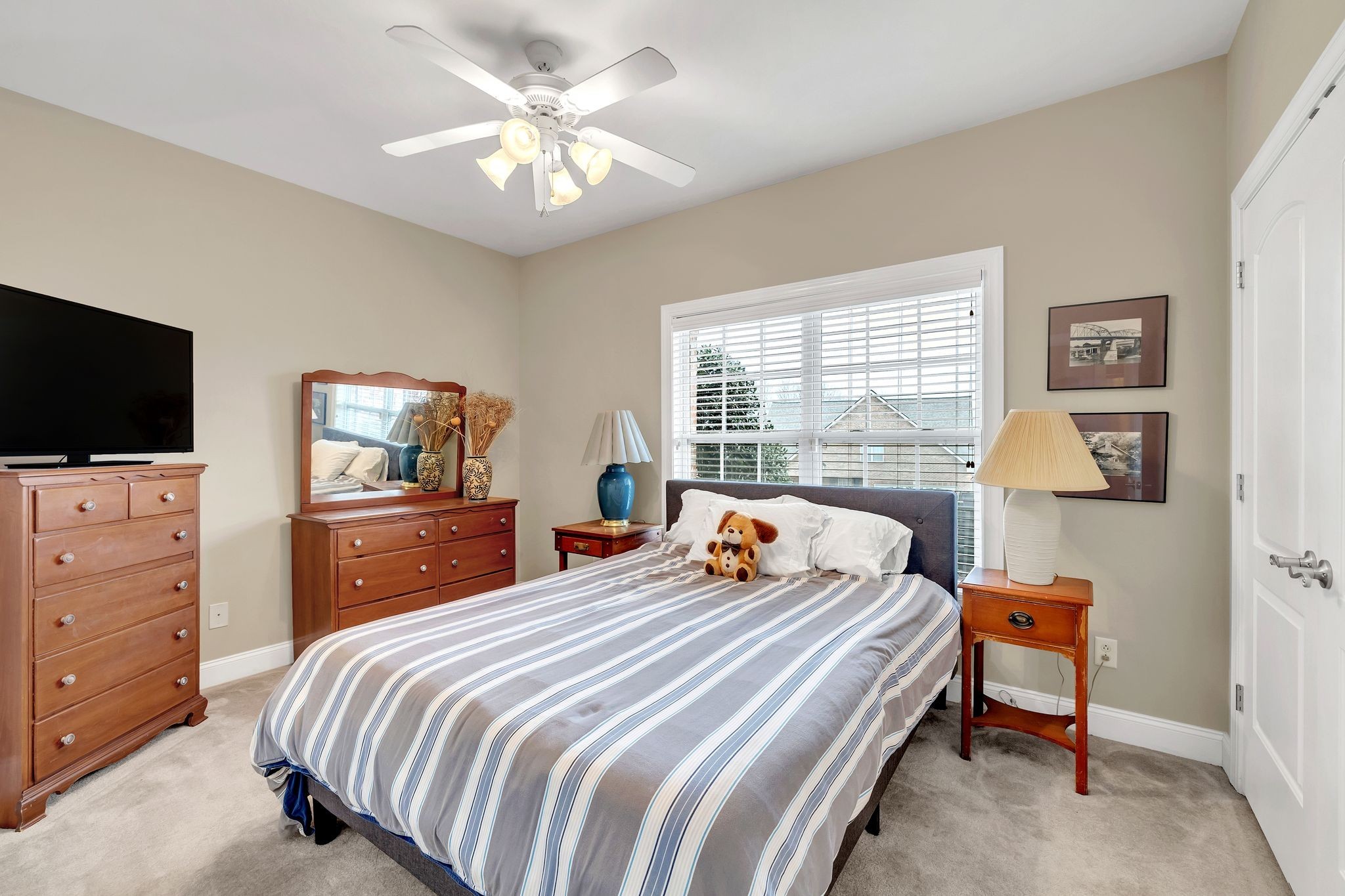 2009 Sunflower Drive Spring Hill, TN 37174 - Photo 26 of 34 a bedroom with a bed and a tv on the dresser