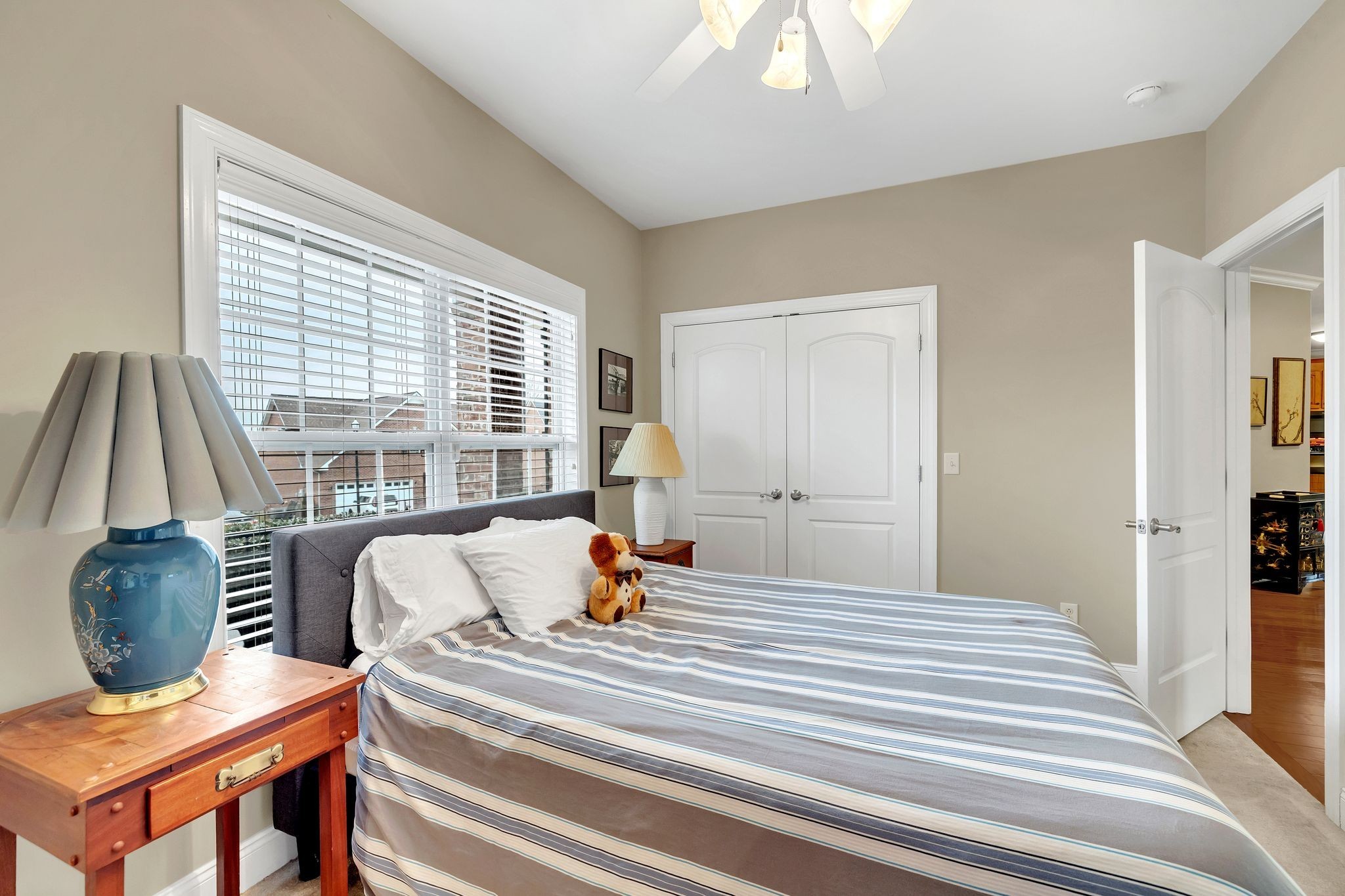 2009 Sunflower Drive Spring Hill, TN 37174 - Photo 27 of 34 a bedroom with a bed and wooden floor