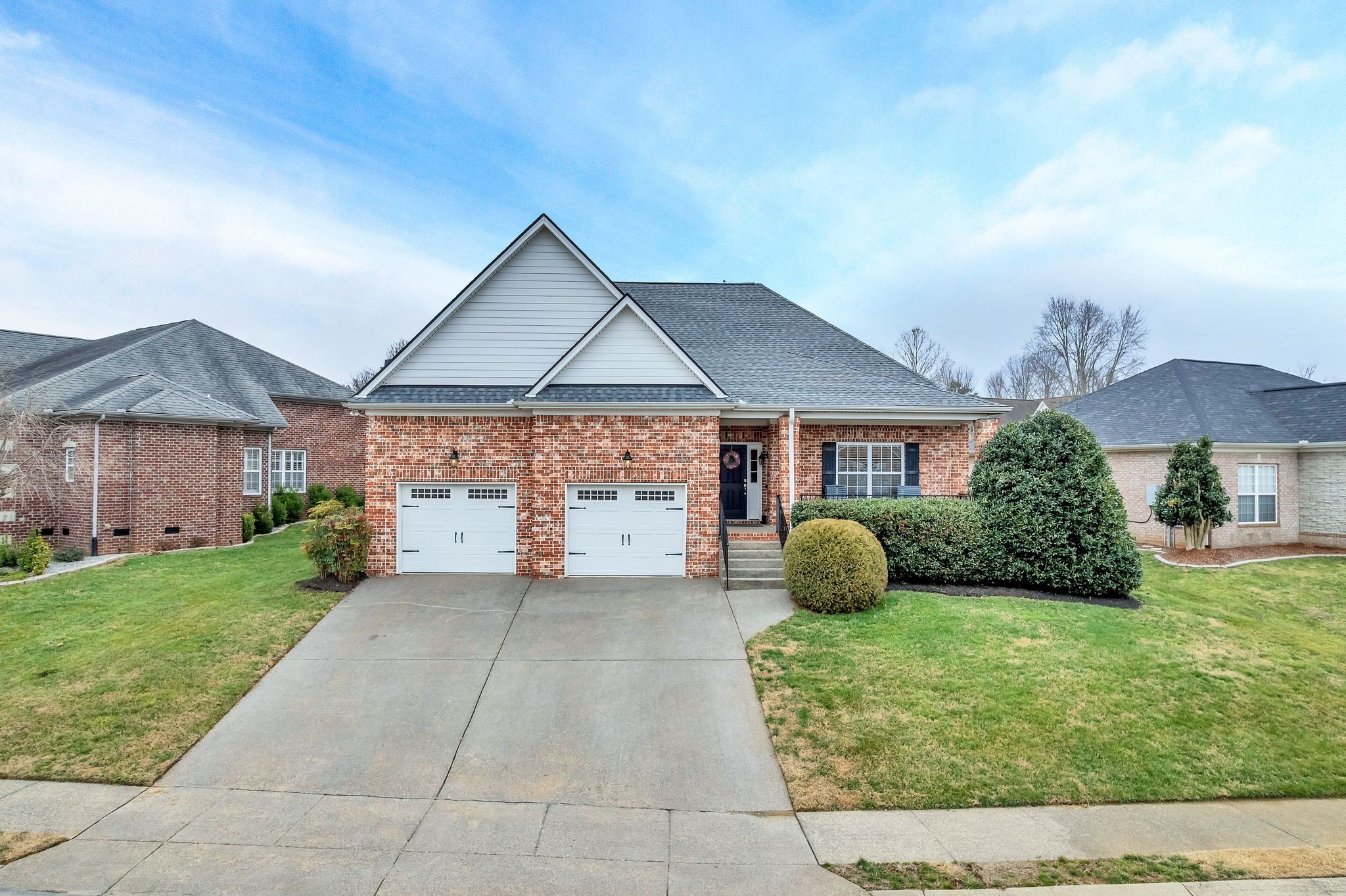 2009 Sunflower Drive Spring Hill, TN 37174 - Photo 4 of 34 a front view of a house with garden
