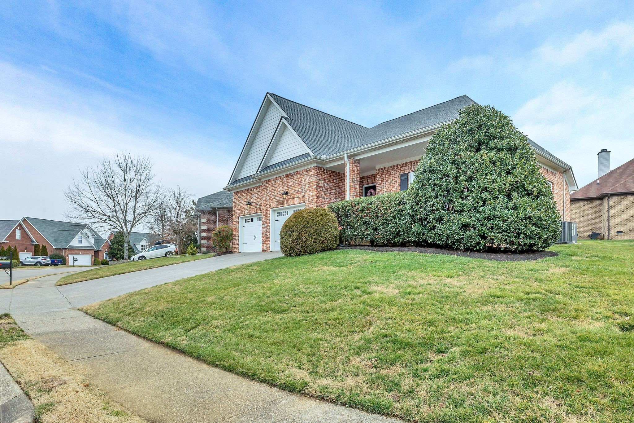 2009 Sunflower Drive Spring Hill, TN 37174 - Photo 6 of 34 front view of a house with a yard
