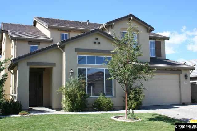 530 Secretariat Court Reno, NV 89521 - Photo 1 of 13 a front view of house with yard