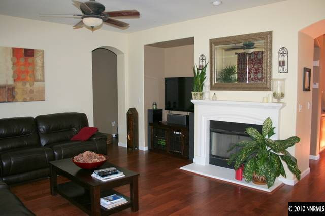 530 Secretariat Court Reno, NV 89521 - Photo 4 of 13 a living room with furniture and a fireplace