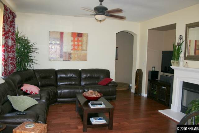 530 Secretariat Court Reno, NV 89521 - Photo 9 of 13 a living room with furniture and a fireplace