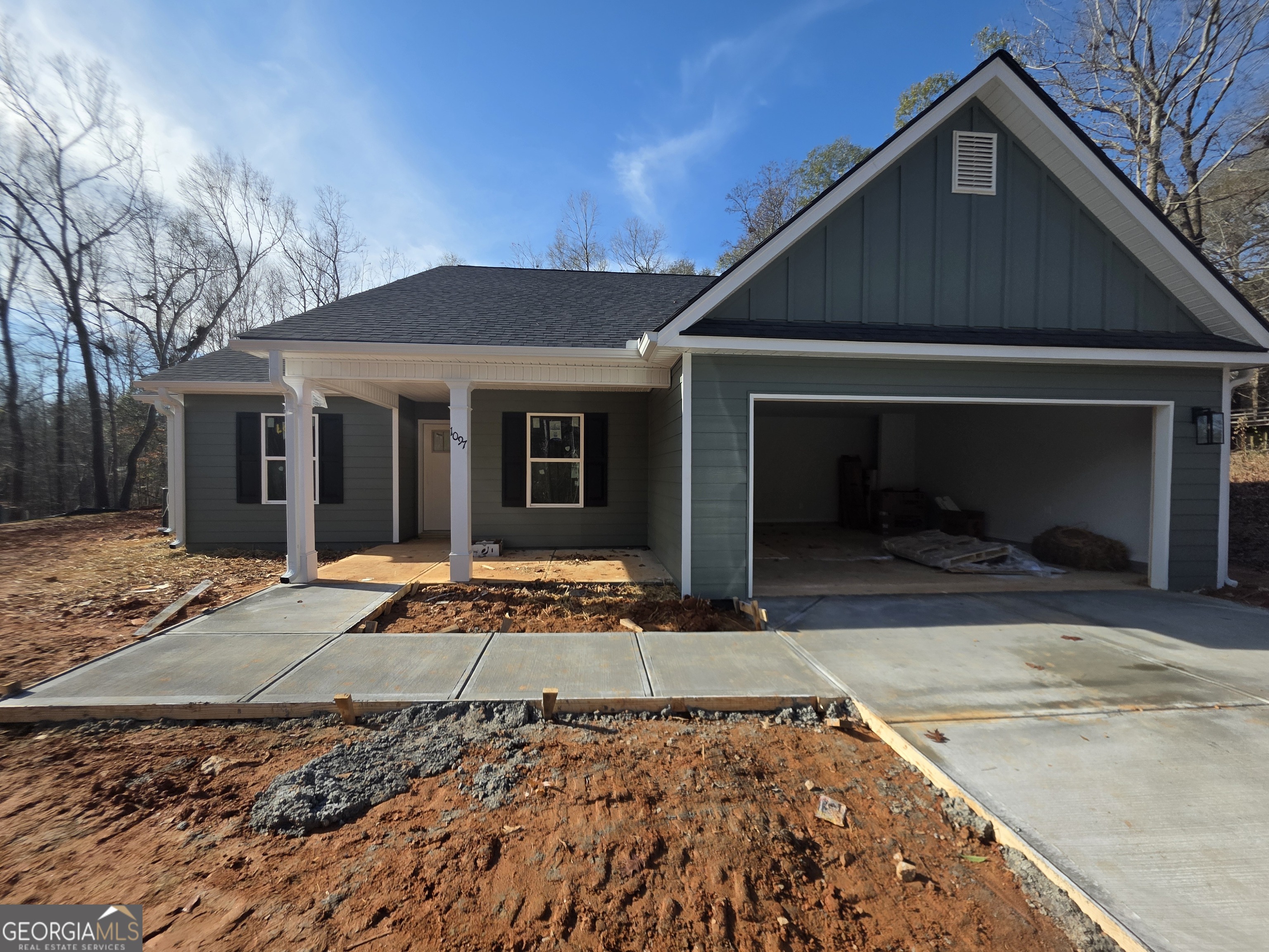 1097 Garnett Ward Road, Unit 1 Hull, GA 30646 - Photo 1 of 1 a front view of a house with garden