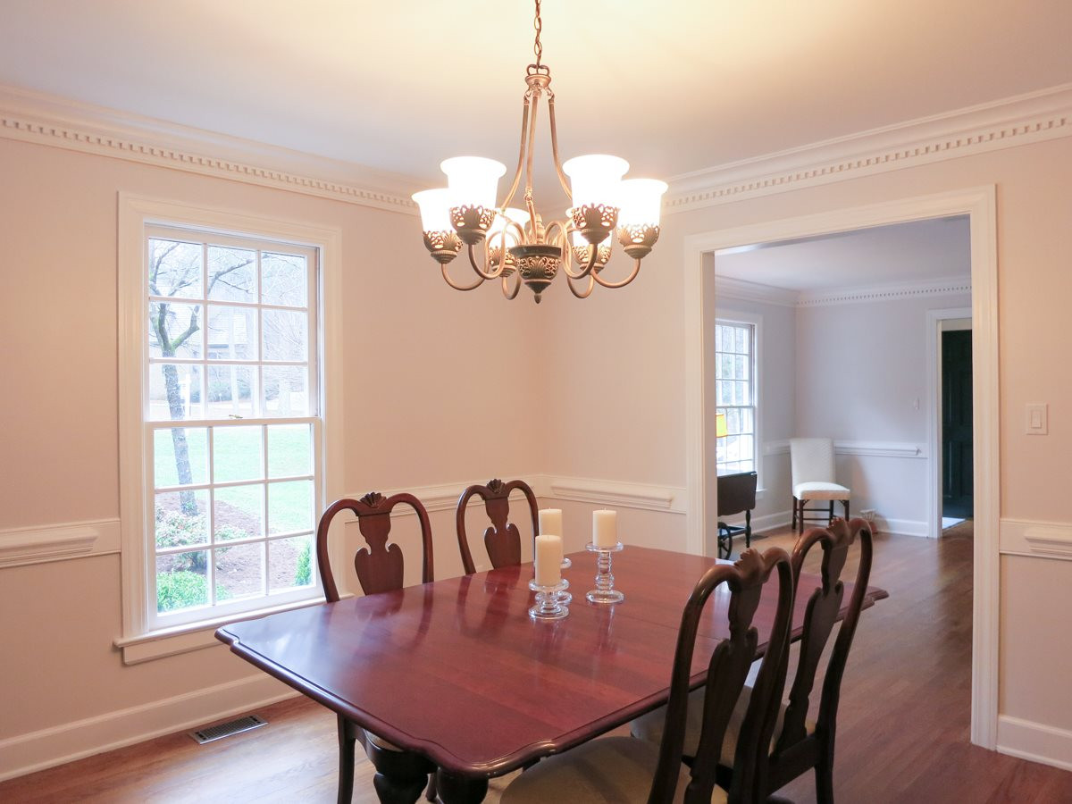 14008 Bingham Drive Raleigh, NC 27614 - Photo 5 of 30 Spacious formal Dinving Rm offers hardwood flr, deep dentil crown molding, chair rail & bronze light fixture. Dining Room