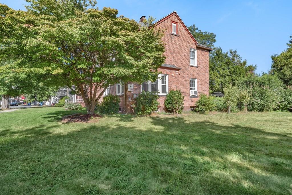 3 Silver Street Springfield, MA 01107 - Photo 6 of 20 a front view of house with yard and green space