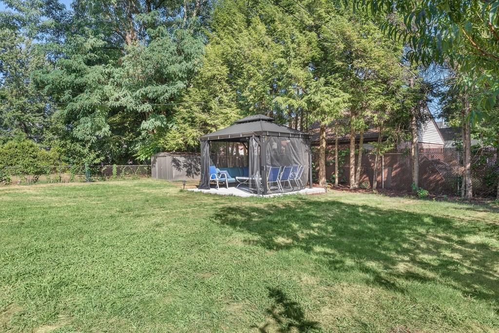 3 Silver Street Springfield, MA 01107 - Photo 7 of 20 a view of a house with a yard porch and sitting area
