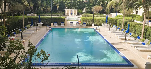 a view of a swimming pool with a patio