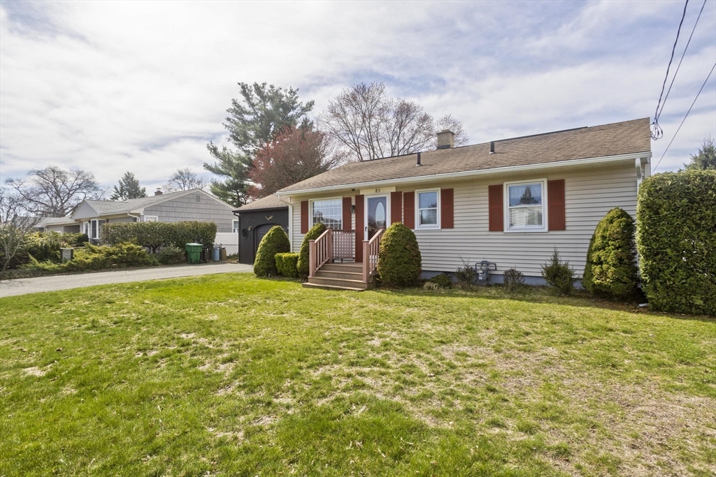 83 Mayflower Avenue Chicopee, MA 01013 - Photo 3 of 34 a view of a house with backyard and garden