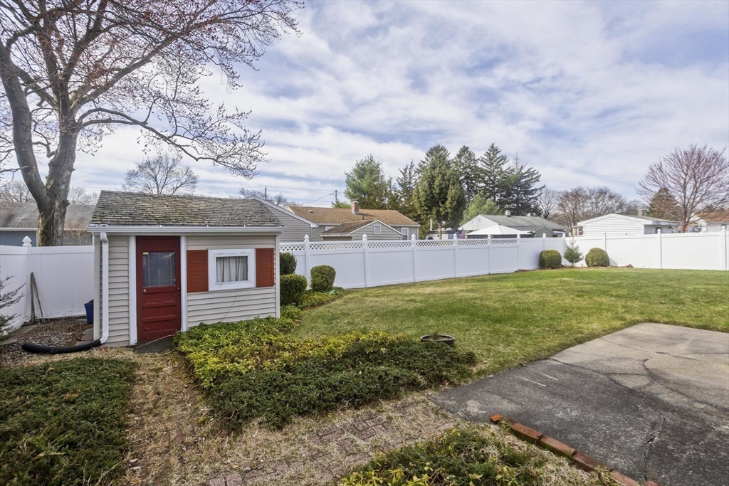 83 Mayflower Avenue Chicopee, MA 01013 - Photo 33 of 34 a view of backyard of house with green space