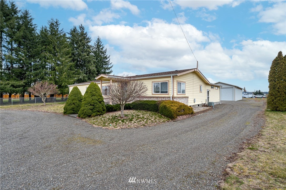 18039 Pendleton Street Southwest Rochester, WA 98579 - Photo 1 of 35 a view of a house with a street