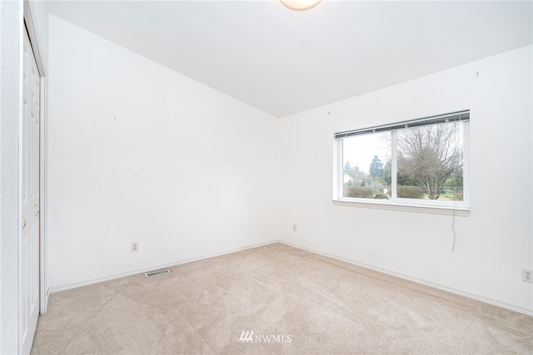 18039 Pendleton Street Southwest Rochester, WA 98579 - Photo 24 of 35 an empty room with a window