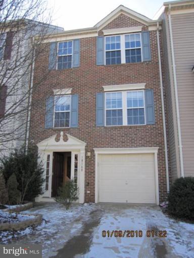 10168 Elgin Way Bristow, VA 20136 - Photo 1 of 6 a front view of a house with yard