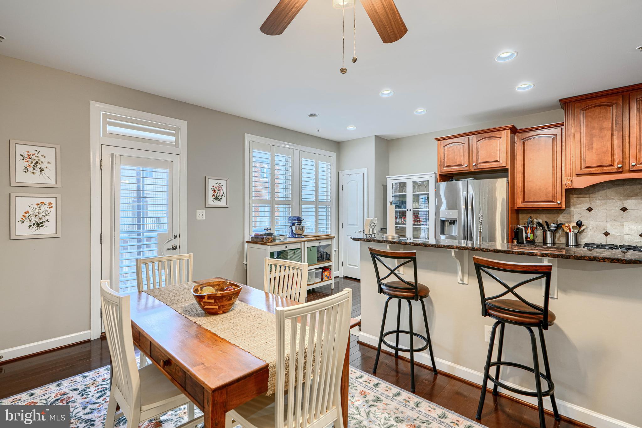 432 Grand Street Gaithersburg, MD 20878 - Photo 14 of 48 a view of a dining room with furniture and wooden floor