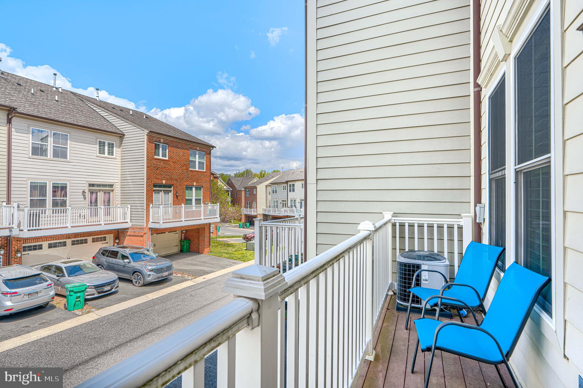 432 Grand Street Gaithersburg, MD 20878 - Photo 21 of 48 a view of a two chairs with an outdoor view