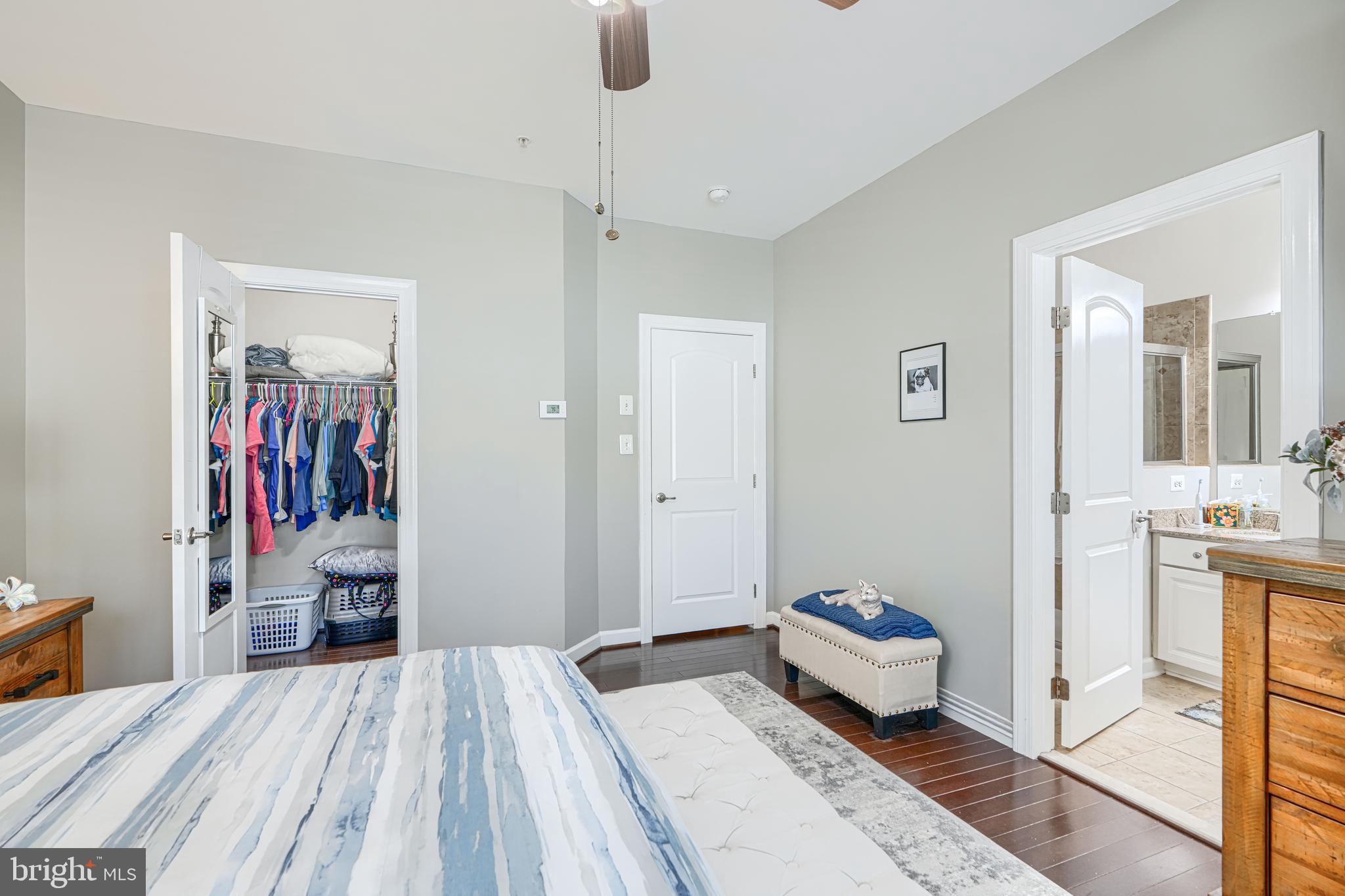432 Grand Street Gaithersburg, MD 20878 - Photo 32 of 48 a bedroom with a bed and wooden floor