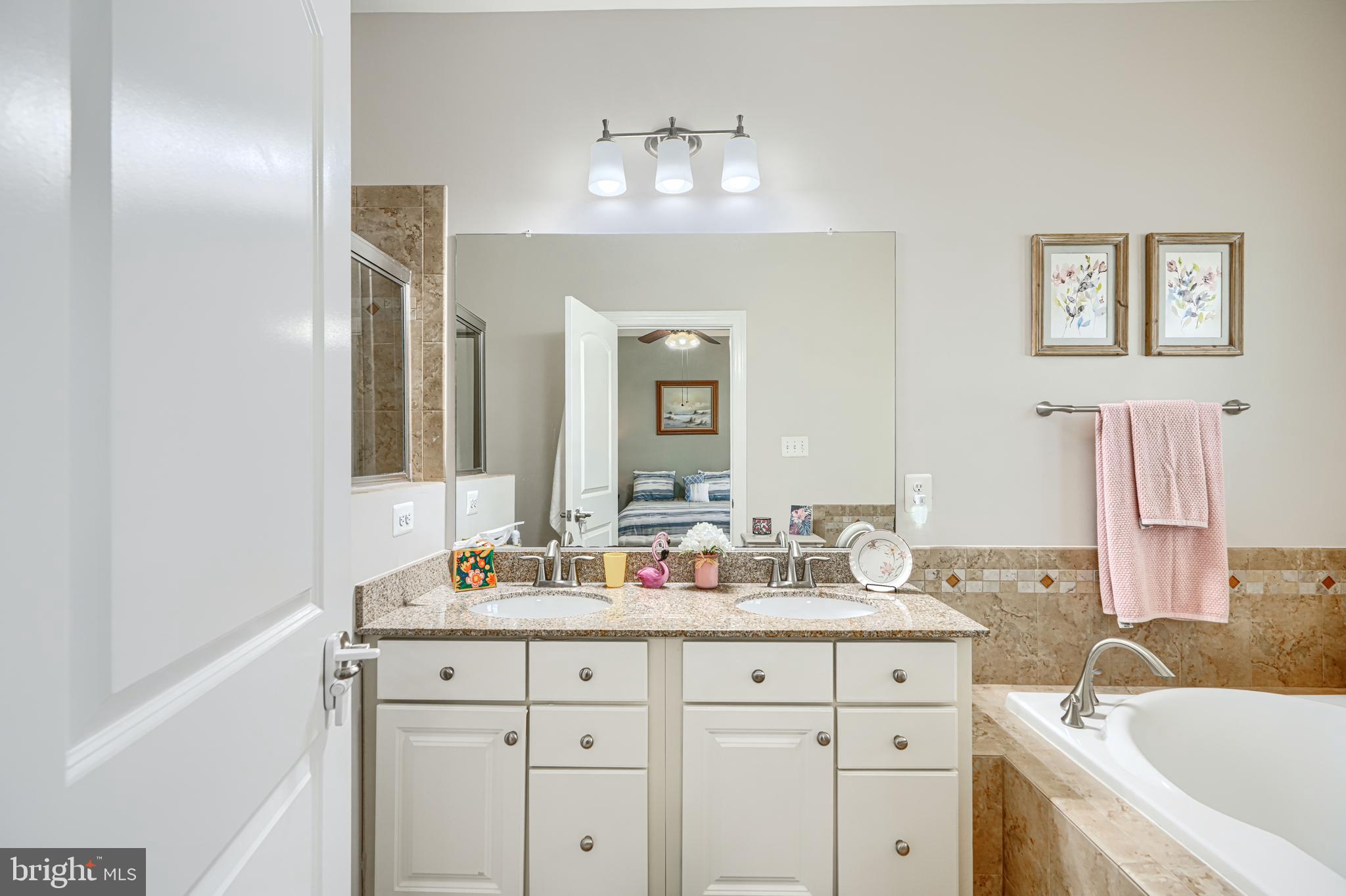 432 Grand Street Gaithersburg, MD 20878 - Photo 33 of 48 a bathroom with a sink double vanity and a mirror