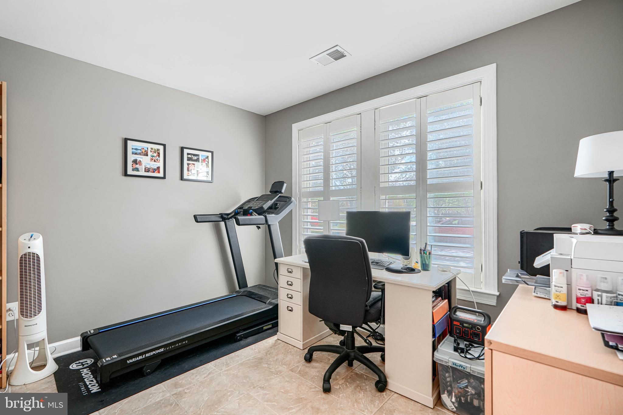 432 Grand Street Gaithersburg, MD 20878 - Photo 4 of 48 a view of a workspace with furniture and a window
