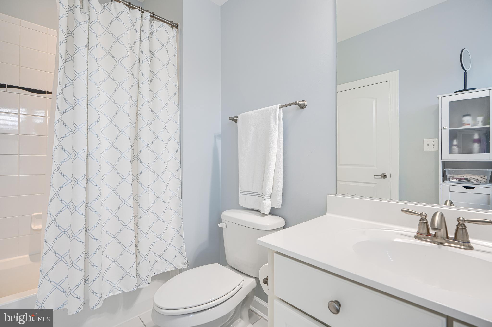 432 Grand Street Gaithersburg, MD 20878 - Photo 45 of 48 a bathroom with a sink a toilet and shower