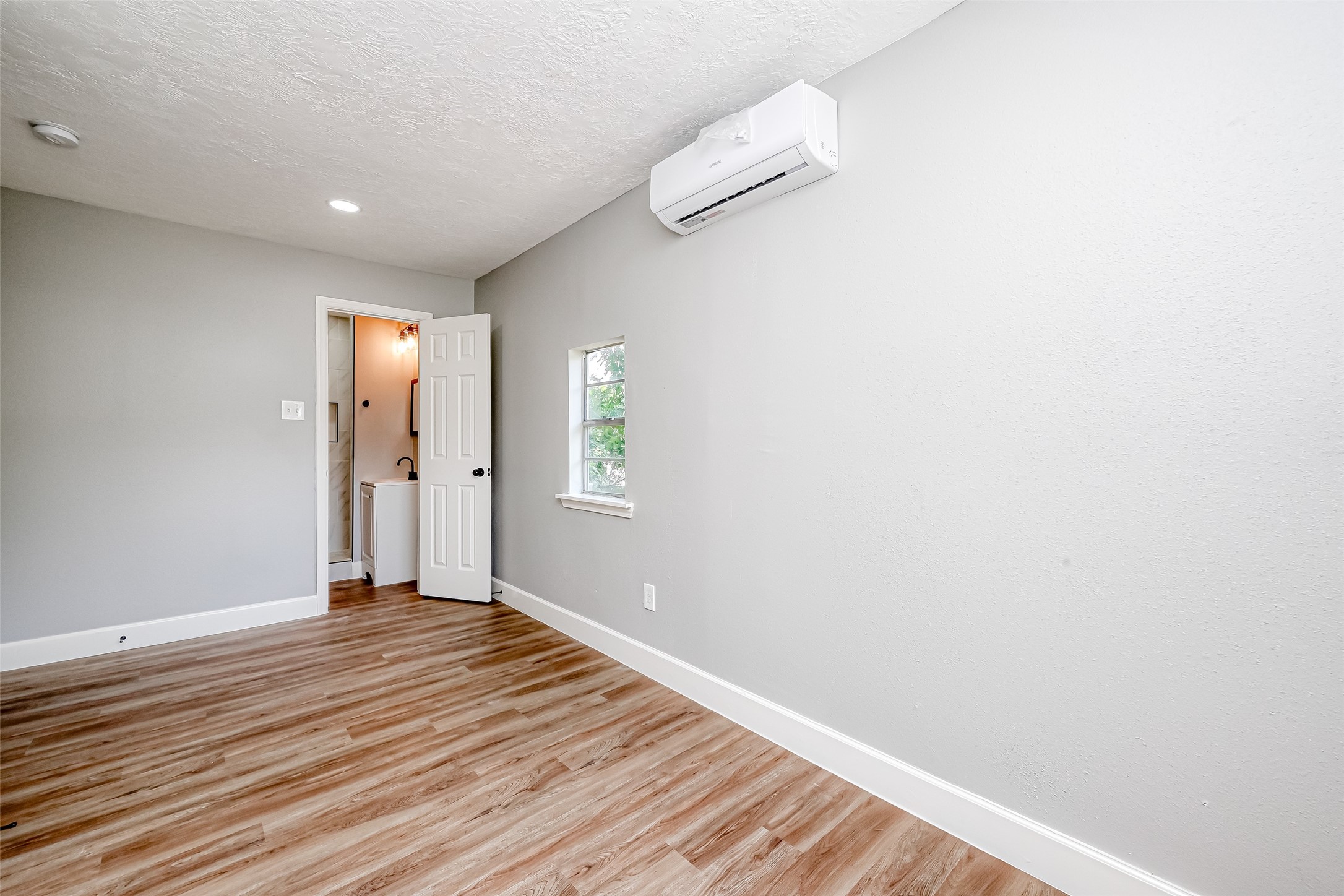 6715 Victoria Street Houston, TX 77020 - Photo 30 of 46 a view of an empty room with wooden floor