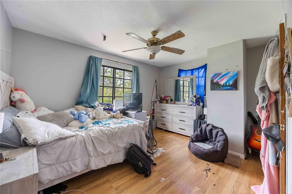 3254 Elliott Street Venice, FL 34292 - Photo 14 of 23 a bedroom with furniture and a window