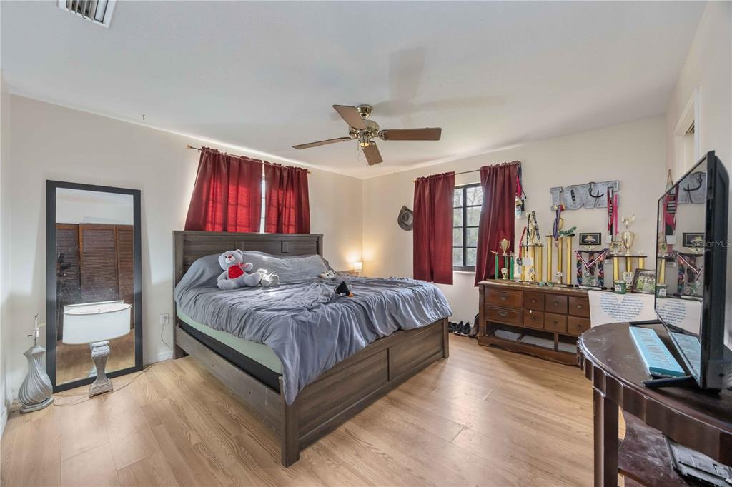 3254 Elliott Street Venice, FL 34292 - Photo 18 of 23 a bedroom with bed and window