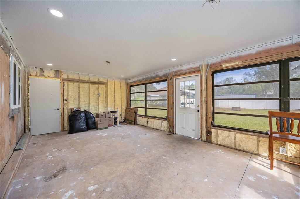 3254 Elliott Street Venice, FL 34292 - Photo 20 of 23 a view of an empty room with a window