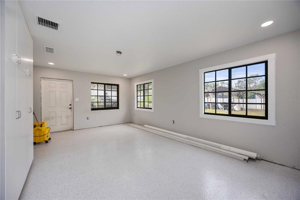 3254 Elliott Street Venice, FL 34292 - Photo 22 of 23 an empty room with windows