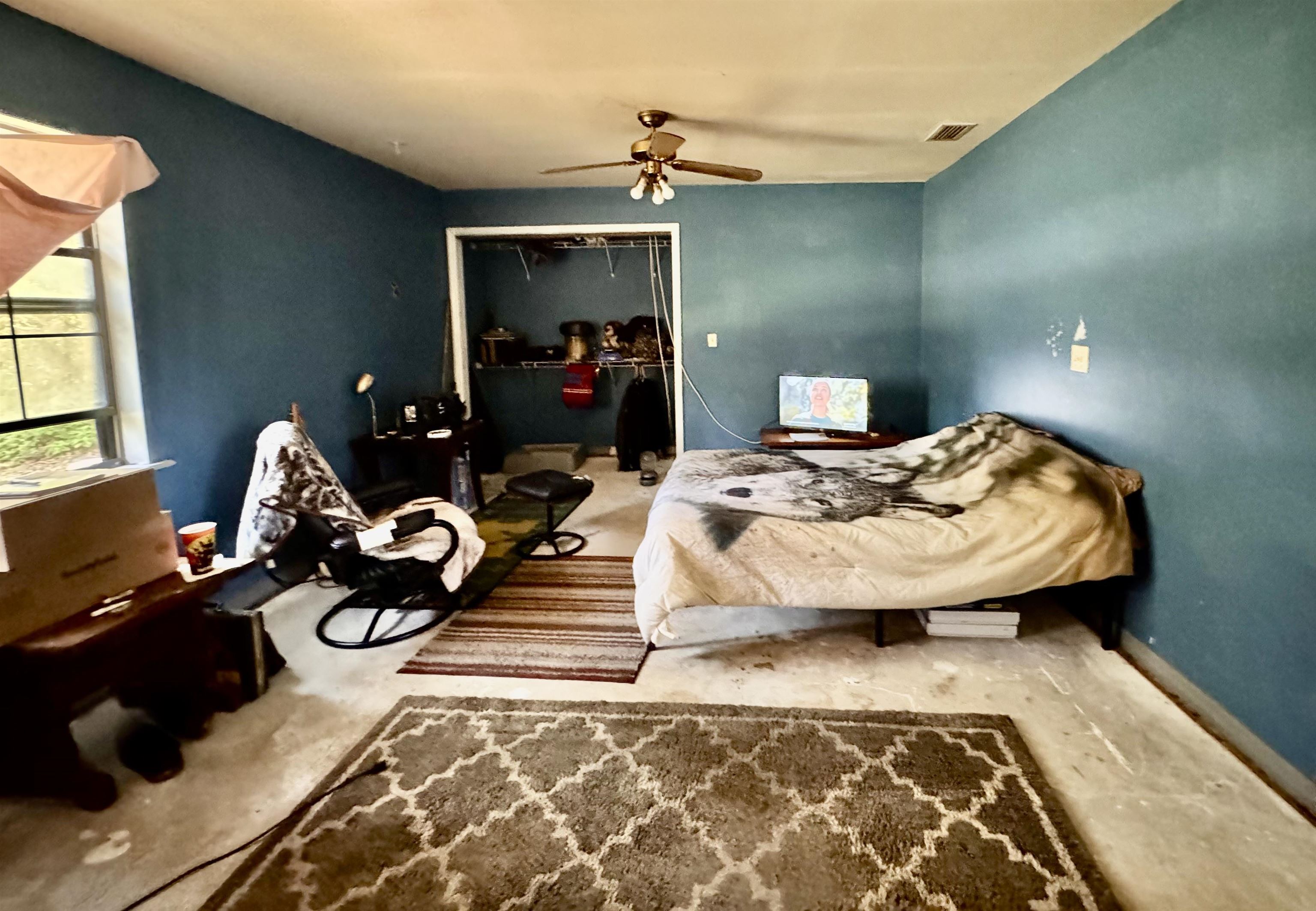 554 Hayley Road St. Augustine, FL 32086 - Photo 30 of 46 a bedroom with bed and a window