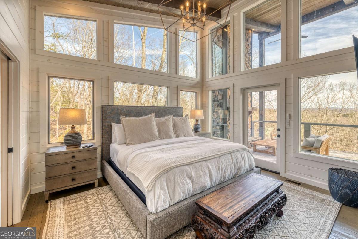 49 Chestnut Overlook Blue Ridge, Unit 11 Blue Ridge, GA 30513 - Photo 22 of 62 a bed room with a bed and a window
