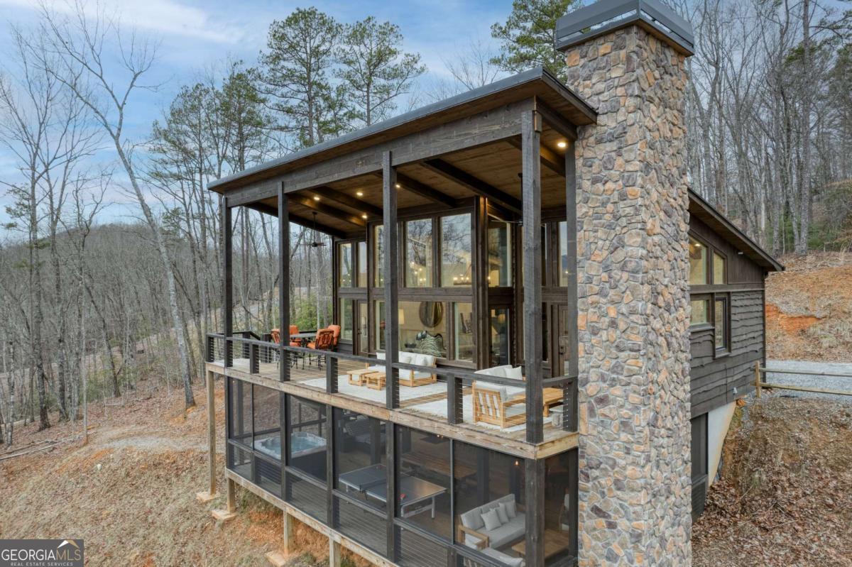 49 Chestnut Overlook Blue Ridge, Unit 11 Blue Ridge, GA 30513 - Photo 50 of 62 a patio with water view