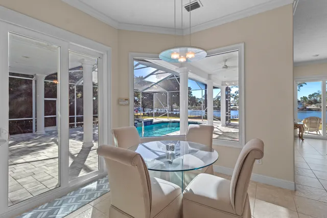 a kitchen with granite countertop a refrigerator and a sink