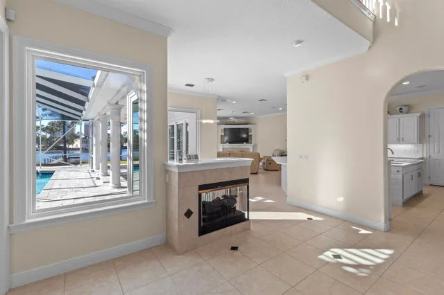 a kitchen with stainless steel appliances a refrigerator and cabinets