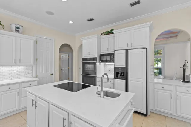 a living room with furniture fireplace and flat screen tv