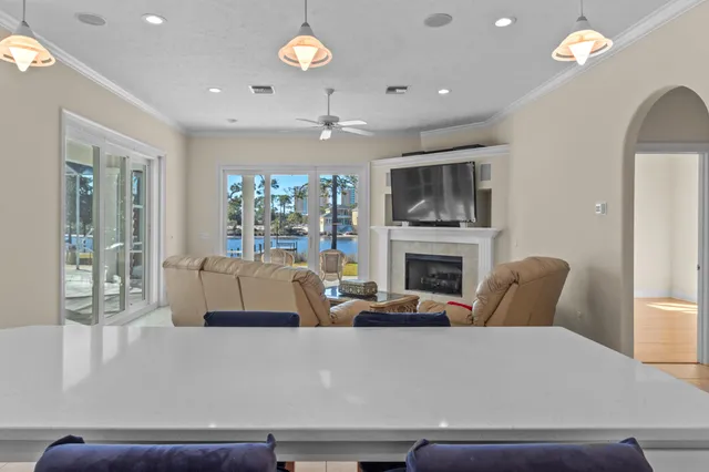a utility room with cabinets washer and dryer