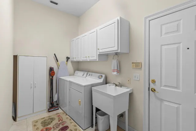 a view of a house with backyard sitting area and porch
