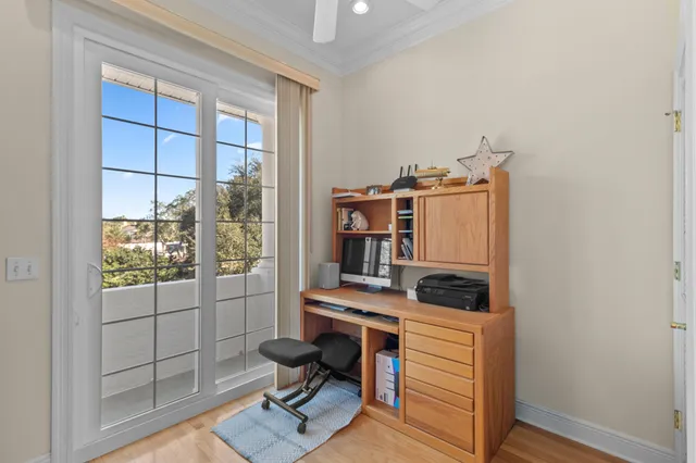 a view of a swimming pool with an outdoor space and seating area