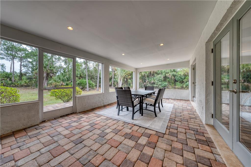 310 27th Street Southwest Naples, FL 34117 - Photo 18 of 22 Covered screened lanai