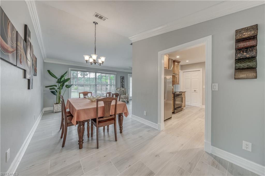 310 27th Street Southwest Naples, FL 34117 - Photo 5 of 22 dining area connected to kitchen