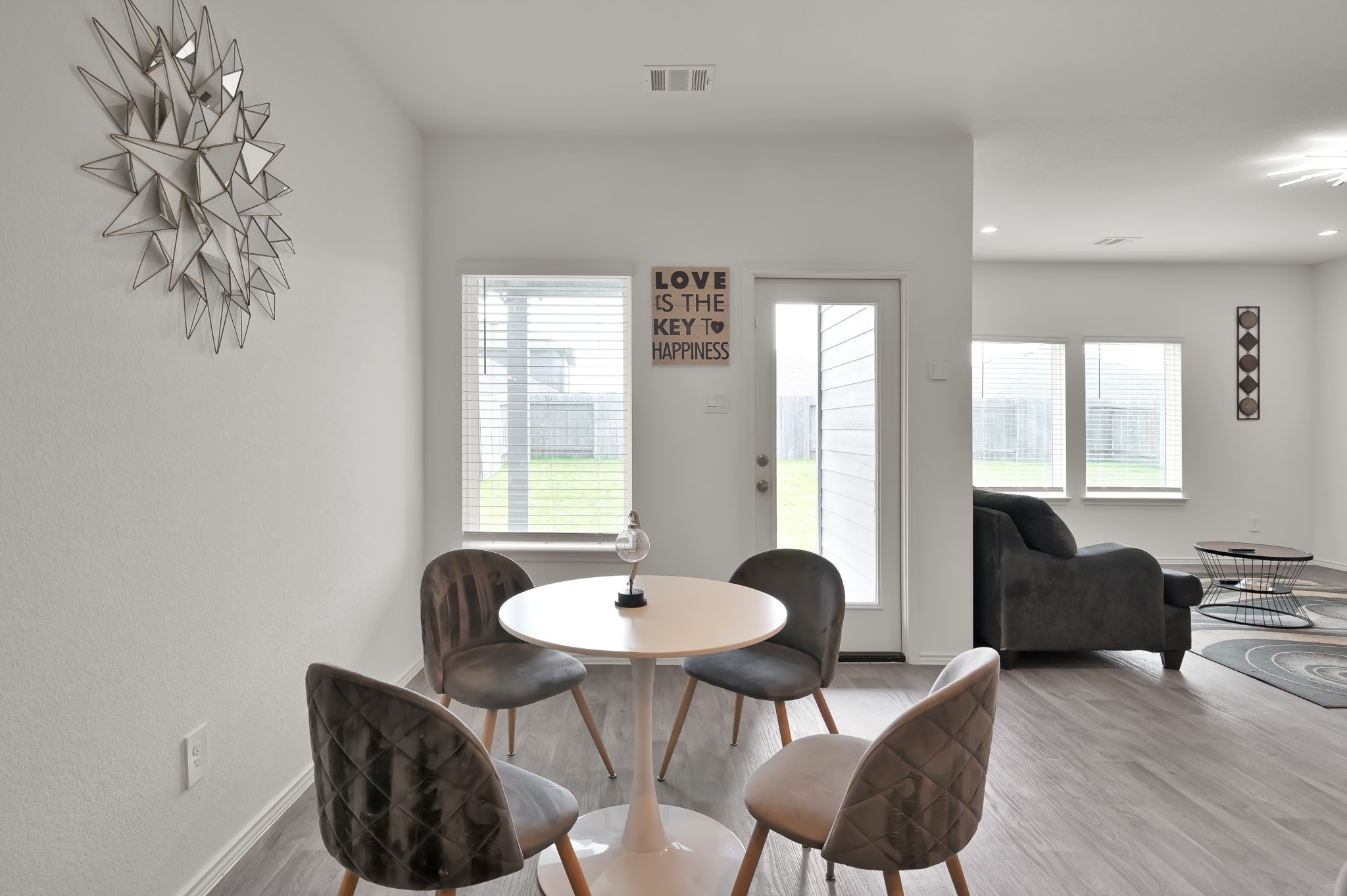 14212 Dream Road New Caney, TX 77357 - Photo 15 of 37 a living room with furniture and a table