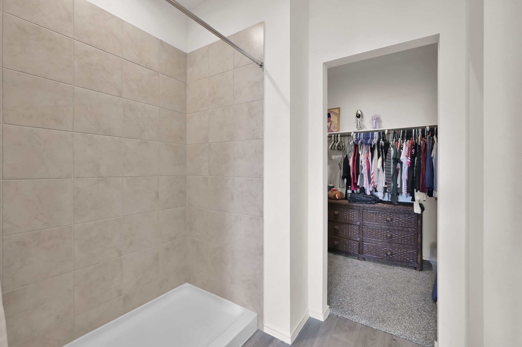 14212 Dream Road New Caney, TX 77357 - Photo 20 of 37 a view of walk in closet