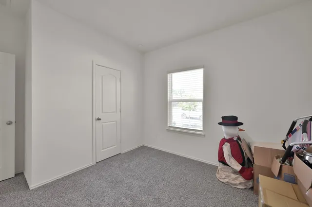 a view of room with gym equipment