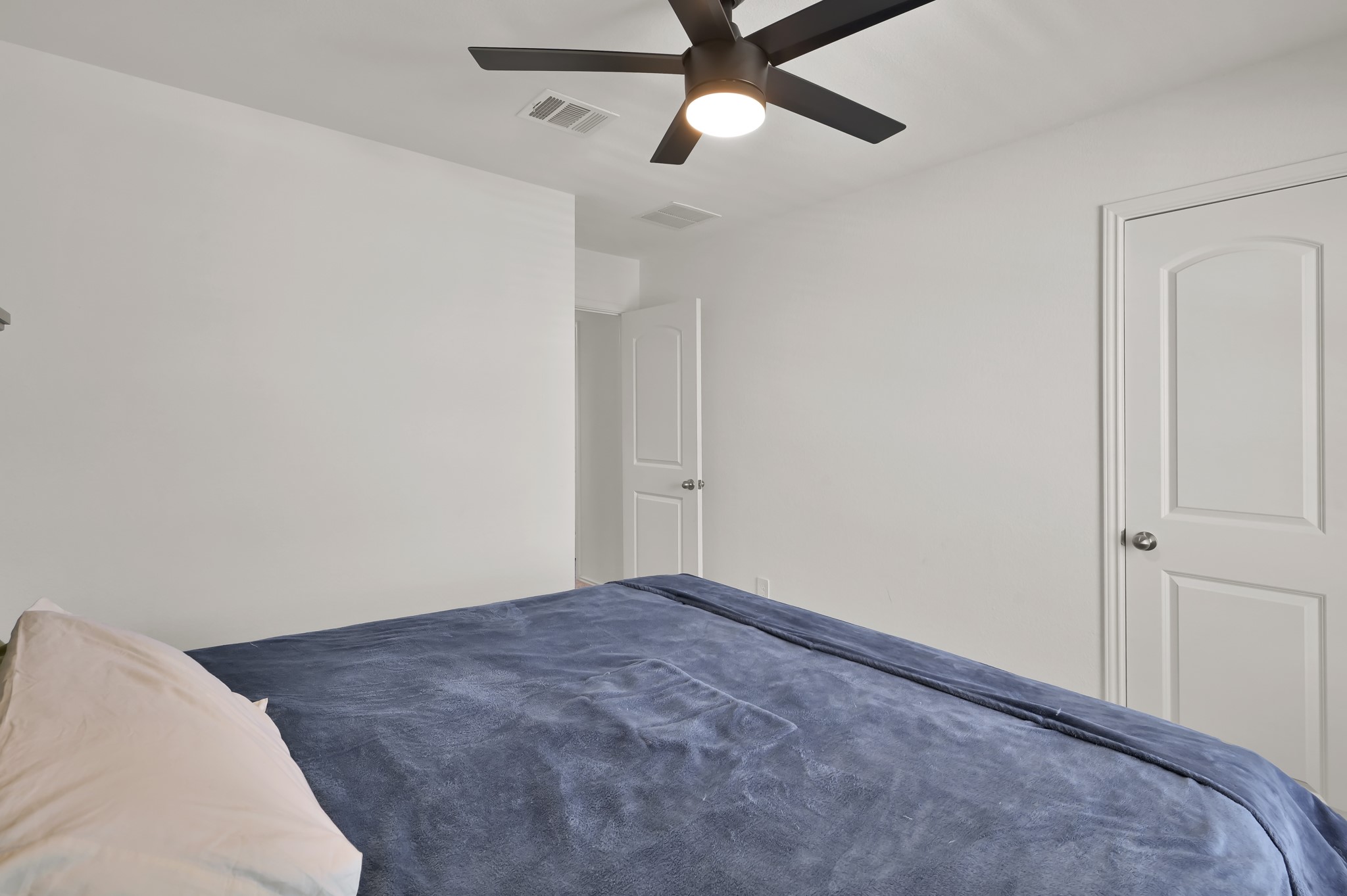 14212 Dream Road New Caney, TX 77357 - Photo 29 of 37 a view of a room with a ceiling fan