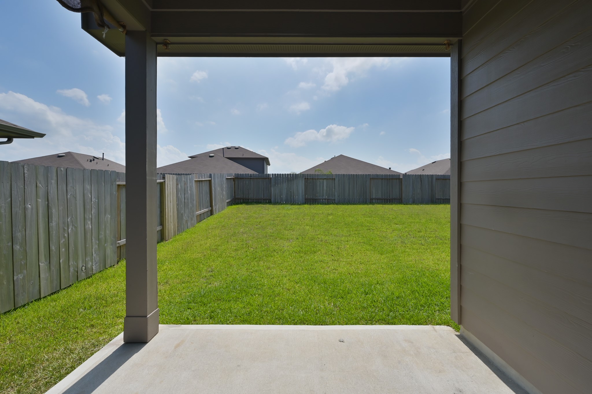 14212 Dream Road New Caney, TX 77357 - Photo 30 of 37 a view of a big yard with potted plants