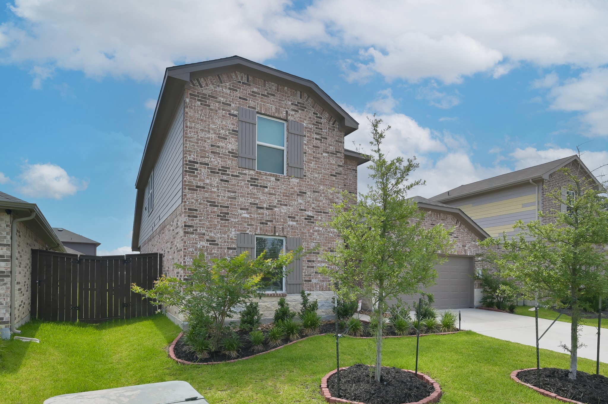 14212 Dream Road New Caney, TX 77357 - Photo 37 of 37 a front view of a house with a yard