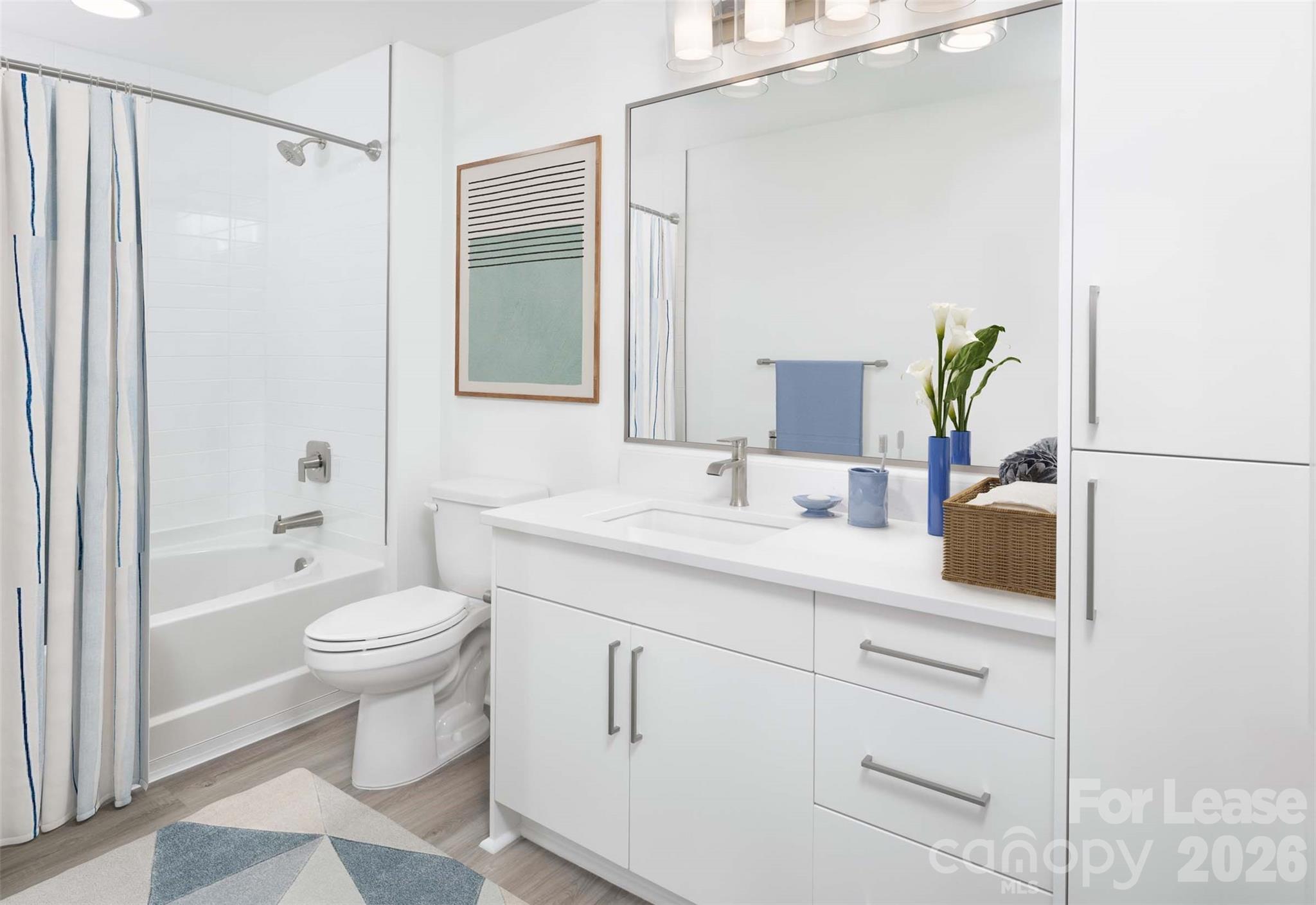 909 Camden Grandview Road, Unit B6A Charlotte, NC 28202 - Photo 17 of 23 a bathroom with a granite countertop sink toilet and shower
