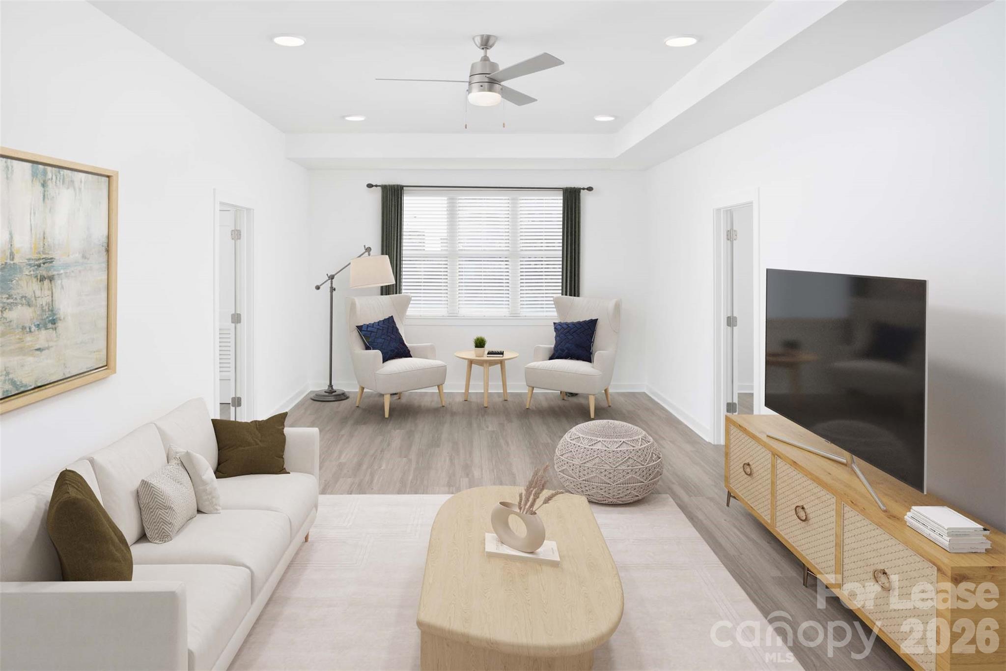 909 Camden Grandview Road, Unit B6A Charlotte, NC 28202 - Photo 22 of 23 a living room with furniture and a flat screen tv